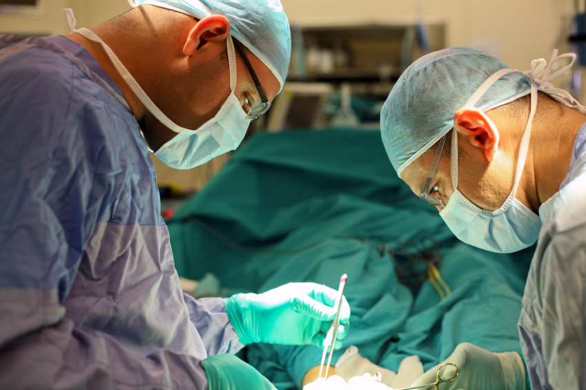 Surgeons operating